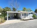 Charming single-story home with a covered carport and cozy front porch, perfect for relaxed living at 3333 26Th E Ave # 28, Bradenton, FL 34208