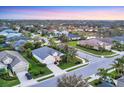Residential neighborhood featuring single-Gathering homes, landscaping, and serene ponds in a desirable location at 4623 Claremont Park Dr, Lakewood Ranch, FL 34211