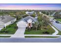 Beautiful single-story home with a well-manicured lawn and mature landscaping in a desirable neighborhood at 4623 Claremont Park Dr, Lakewood Ranch, FL 34211