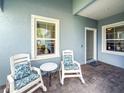 Cozy covered patio with stylish outdoor seating, perfect for relaxing at 6280 Cassia St, Bradenton, FL 34203