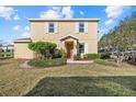 Charming two-story home with neat landscaping, set on a well maintained lawn at 14932 Amberjack Ter, Lakewood Ranch, FL 34202