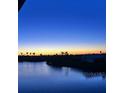 Sunset view overlooking the waterfront at 1783 Lake Pl # 1783C, Venice, FL 34293