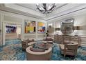 Sophisticated lounge featuring plush seating, modern art, and stylish decor for relaxed gatherings at 1111 Ritz Carlton Dr # 1704, Sarasota, FL 34236