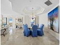 Bright dining area with a modern table setting, stylish chairs, and an open layout perfect for entertaining and Gathering gatherings at 2161 Gulf Of Mexico Dr # 3, Longboat Key, FL 34228