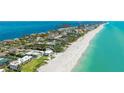 Aerial view of beachfront condo complex with beautiful beach and Gulf views at 5155 Gulf Of Mexico Dr # 9, Longboat Key, FL 34228