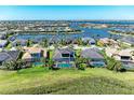 Extensive aerial view of the single Gathering homes showing a beautiful lakeside community at 5602 Tidewater Preserve Blvd, Bradenton, FL 34208