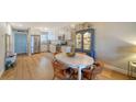 Open concept living space with a kitchen, dining area, and modern furnishings at 6033 34Th W St # 35, Bradenton, FL 34210