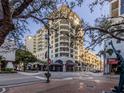 Charming building with street-level stores and eateries near a brick-paved intersection at 100 Central Ave # C521, Sarasota, FL 34236