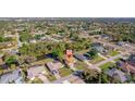 Aerial view of the neighborhood with mature trees and waterway access for the homes at 1224 Inverness St, Port Charlotte, FL 33952