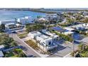 Prime waterfront real estate showcasing modern home's architectural design and lush landscaping at 1354 Westway Dr, Sarasota, FL 34236