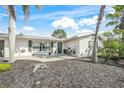 Attractive home featuring a brick patio area, perfect for outdoor seating and relaxing at 2427 Tulip St, Sarasota, FL 34239