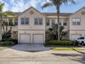 Charming townhome with a two-car garage, well-manicured landscaping, and a sunny, inviting appearance at 3826 Virga Blvd, Sarasota, FL 34233