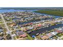 Waterfront property on a canal with direct Gulf access, boasting a private dock at 108 Peckham Sw St, Port Charlotte, FL 33952