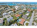Aerial view of waterfront homes in a beautiful community, showcasing the area's desirable location at 412 Pheasant Way, Sarasota, FL 34236