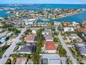 Expansive aerial view of a coastal community, highlighting the marinas and waterfront properties at 412 Pheasant Way, Sarasota, FL 34236