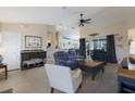 Bright and open living area with tile flooring and comfortable seating at 1269 Rasp Ct, North Port, FL 34288