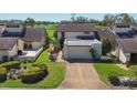 Well-maintained townhome with a driveway, garage, and meticulous landscaping at 4532 La Jolla Dr, Bradenton, FL 34210