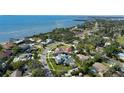 Aerial view shows property's location near the water and surrounding neighborhood at 7715 Westmoreland Dr, Sarasota, FL 34243