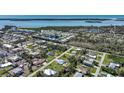Panoramic aerial view of a coastal community with homes and waterways in Florida at 8219 Drew St, Englewood, FL 34224