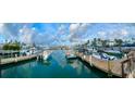 Picturesque marina showcasing an array of boats and yachts on tranquil blue waters at 8219 Drew St, Englewood, FL 34224