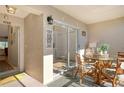 Inviting patio with glass table and comfortable seating perfect for outdoor dining at 9570 High Gate Dr # 1722, Sarasota, FL 34238