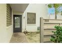 Private entrance with a decorative textured walkway at 333 Springdale Dr # 333, Bradenton, FL 34210