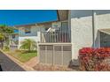 Charming condo exterior with well-maintained landscaping and private balcony at 4234 Gulf Of Mexico Dr # Q2, Longboat Key, FL 34228