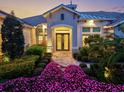 Inviting front entrance with a well-maintained landscape and a brick walkway leading to the front door at 556 Regatta Way, Bradenton, FL 34208