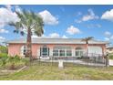 Inviting single-Gathering home with well-maintained front yard and beautiful curb appeal at 6023 Mayberry Ave, North Port, FL 34287