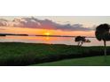 Scenic water view at sunset with vibrant colors and a serene atmosphere at 4753 Independence Dr, Bradenton, FL 34210
