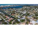 Beautiful aerial view of waterfront community with canals, homes with pools, docks and access to bay and ocean at 6136 Hollywood Blvd, Sarasota, FL 34231