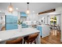 Charming kitchen with modern appliances and a cozy dining area at 7701 Palm Dr, Holmes Beach, FL 34217