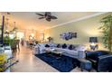 Cozy living room showcasing stylish furniture, decor, and a relaxing atmosphere for gatherings at 20186 Benissimo Dr, Venice, FL 34293
