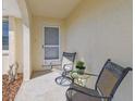 Cozy front porch with seating area, perfect for relaxing and enjoying the outdoors at 2412 15Th W St, Palmetto, FL 34221