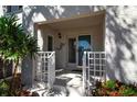Inviting entrance with white railing and decorative mermaid at 318 108Th St W # 318, Bradenton, FL 34209