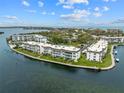 Waterfront condominiums with boat docks on a scenic bay, offering a tranquil lifestyle at 4310 Falmouth Dr # 304, Longboat Key, FL 34228