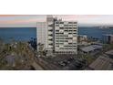 A multi-story building featuring convenient covered parking and stunning beach access at 4822 Ocean Blvd # 11E, Sarasota, FL 34242