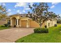 Well-maintained single-story home featuring a spacious three-car garage at 5342 98Th E Ave, Parrish, FL 34219