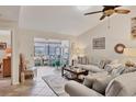 Bright living room with neutral tones and a seamless flow to the lanai, perfect for relaxation at 7223 Wood Creek Dr # 22, Sarasota, FL 34231