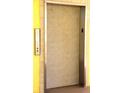 Elevator with button panel inside a yellow building at 2060 Willow Hammock Cir # 201, Punta Gorda, FL 33983