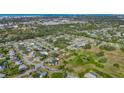 Aerial view of the property showcasing its location in a neighborhood setting close to the city at 2476 Breakwater Cir, Sarasota, FL 34231