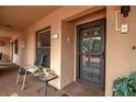 Front porch with cozy chair and welcoming decor at 2808 60Th W Ave # 1722, Bradenton, FL 34207