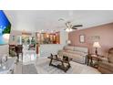 Inviting living room with open floor plan and tile floors at 5562 Hayden Blvd, Sarasota, FL 34232