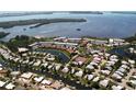 Waterfront community featuring picturesque views, lush landscaping, and convenient access to recreational activities at 9414 Andover Cir, Bradenton, FL 34210