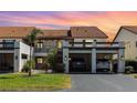 Charming townhouse featuring private parking, lush landscaping, and a serene residential atmosphere at 756 Avenida Estancia # 162, Venice, FL 34292