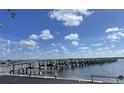 Scenic waterfront view with multiple docks, perfect for boating enthusiasts at 8625 Midnight Pass Rd # 305B, Sarasota, FL 34242