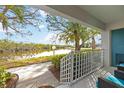 Scenic waterfront views from this condo's private patio, offering a peaceful retreat at 321 108Th W St # 120, Bradenton, FL 34209
