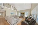 Bright, open living room featuring high ceilings, natural light, and modern, comfortable furnishings at 5007 2Nd Ave, Holmes Beach, FL 34217