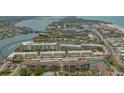 Aerial view of community with condos, beaches and waterfront access at 1250 N Portofino Dr # 303, Sarasota, FL 34242
