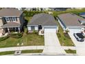 Lovely single-story home with a two-car garage and well-maintained front yard at 17715 Cantarina Cv, Bradenton, FL 34211